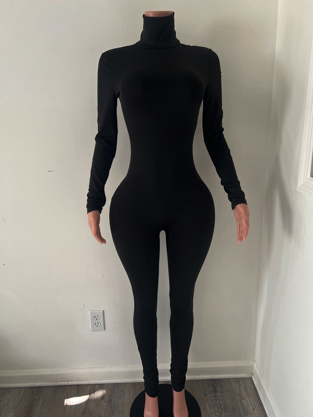 Black turtle neck one piece